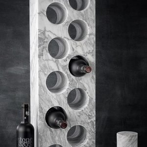 Italian Marble Gin Whiskey Wine Rack with wine bottles and drilled cores showing